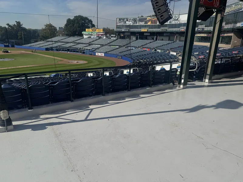 Coated concourse floor at the Trenton Thunder stadium overlooking the seats and field